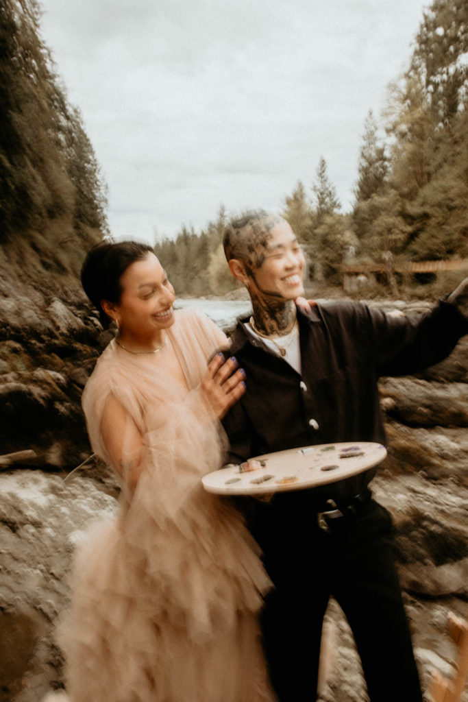 slow motion photo of couple making art during elopement 