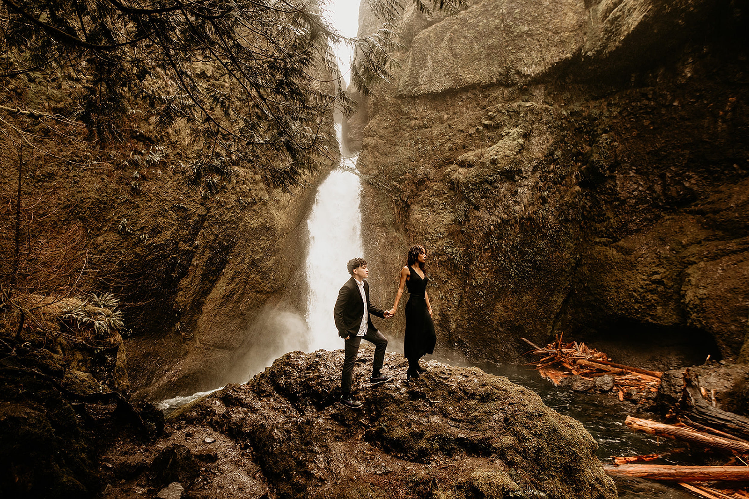 couple standing at wahclella falls