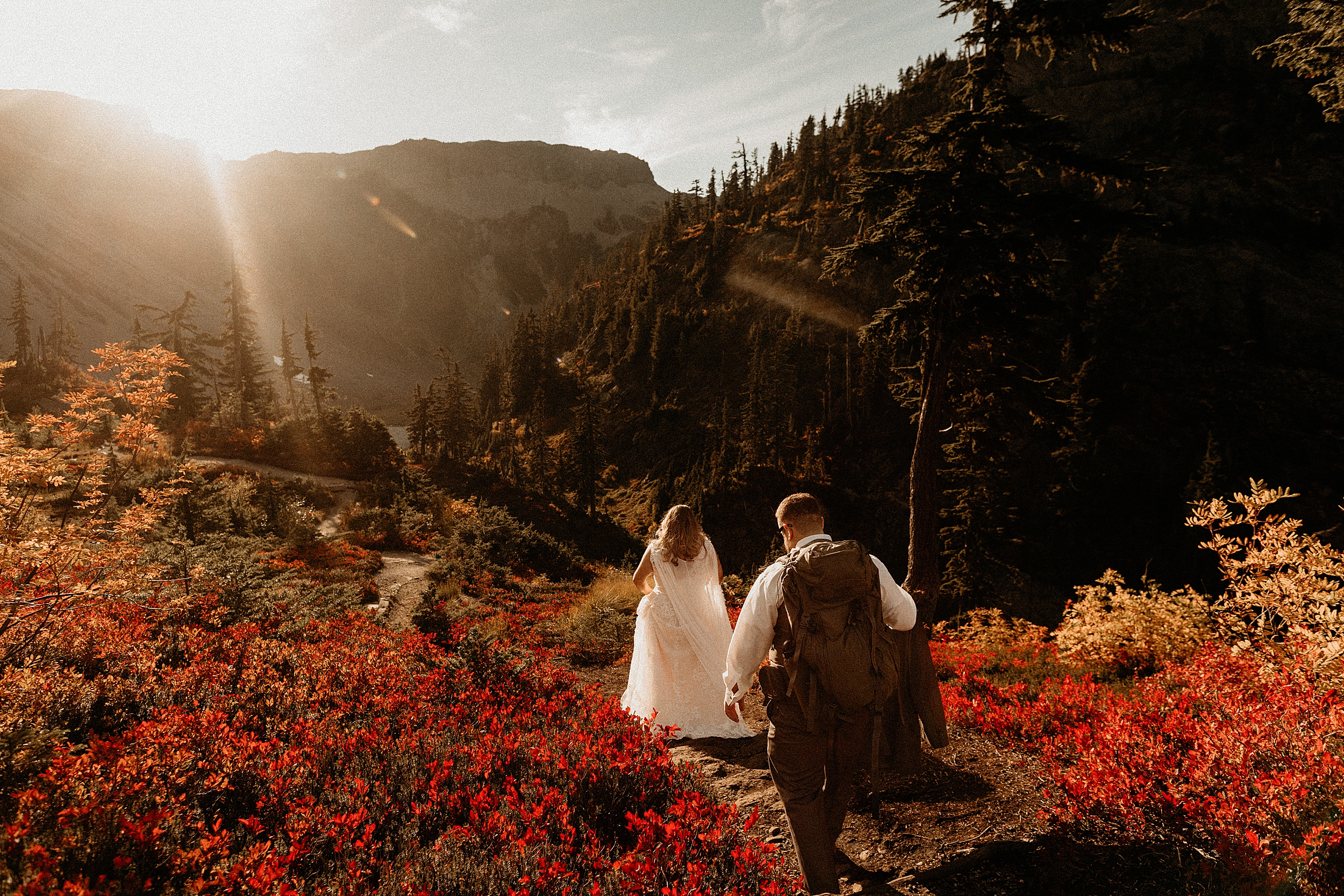 bride and groom hiking at mount baker