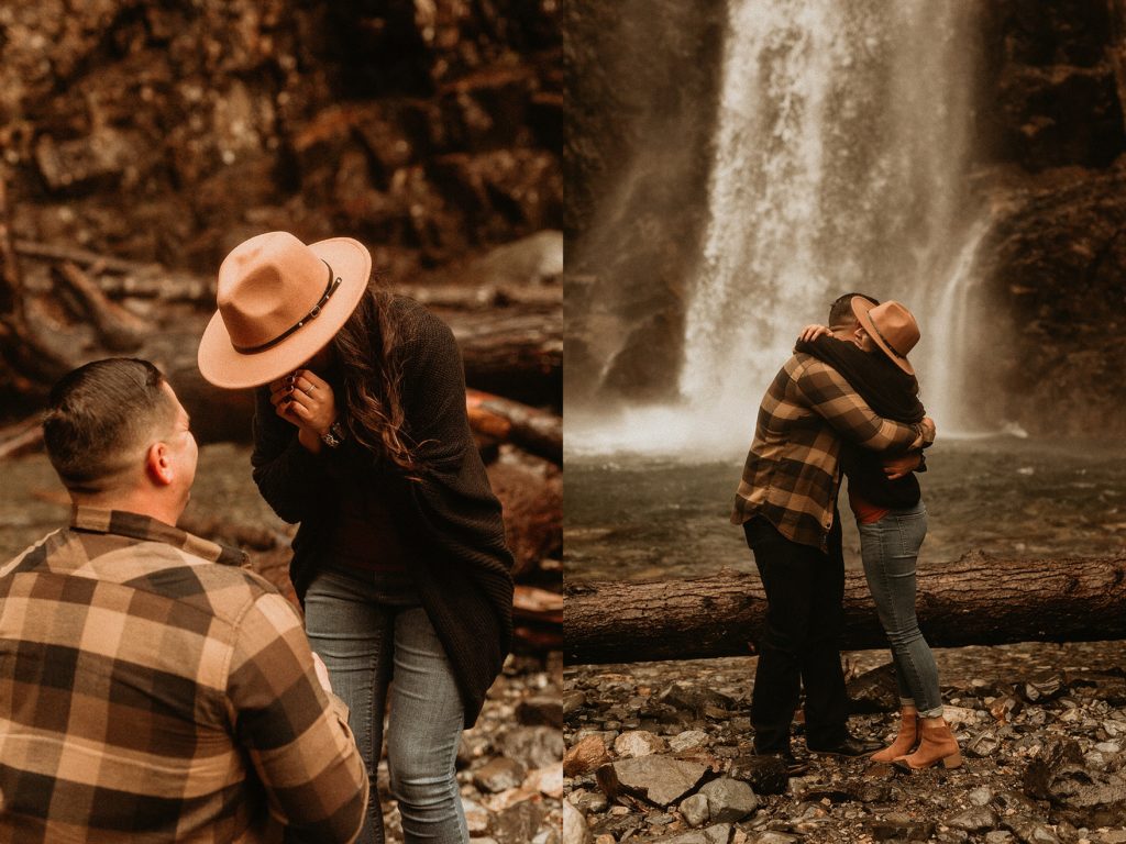 couple getting engaged in front of franklin falls 