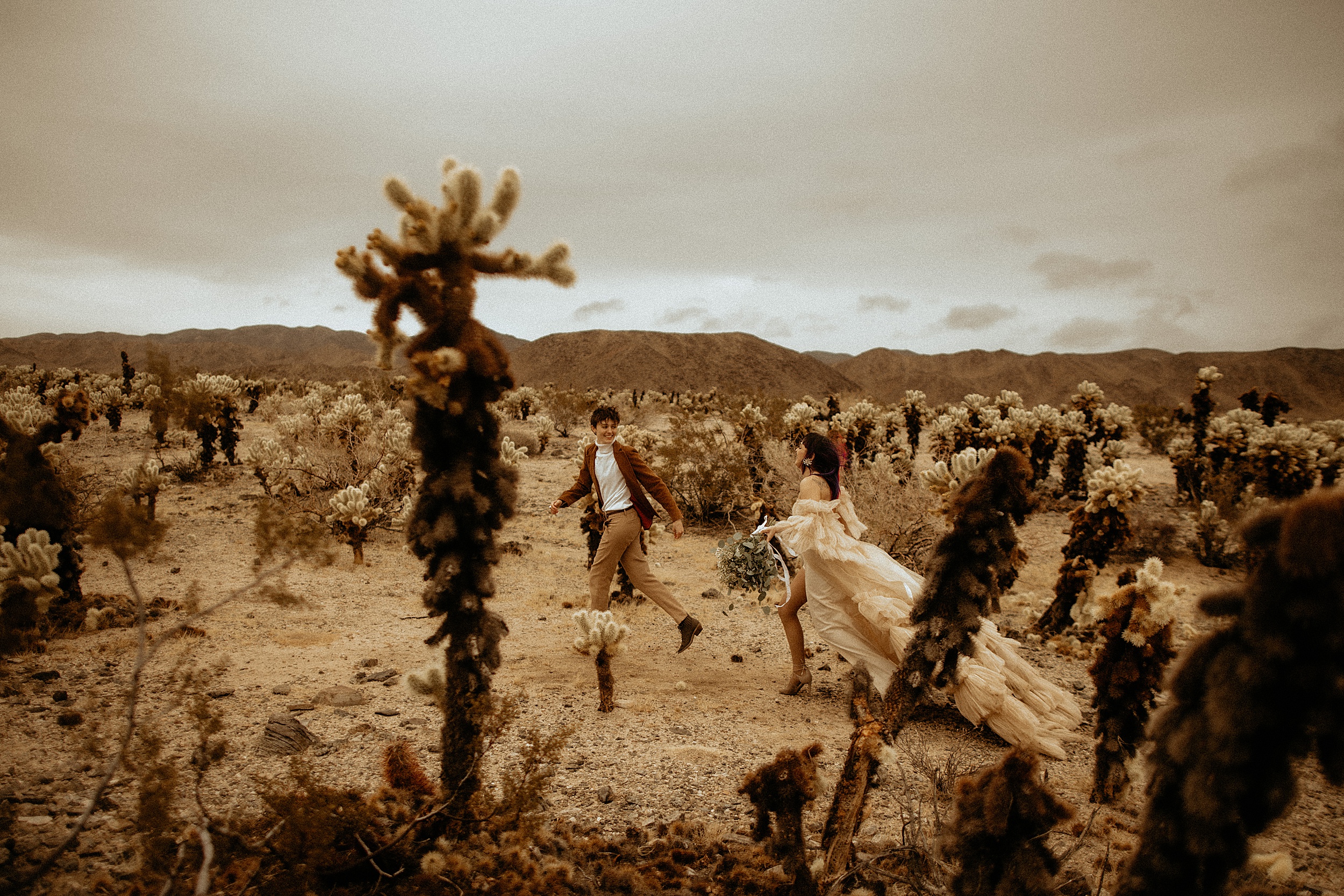 couple walking together desert landscape