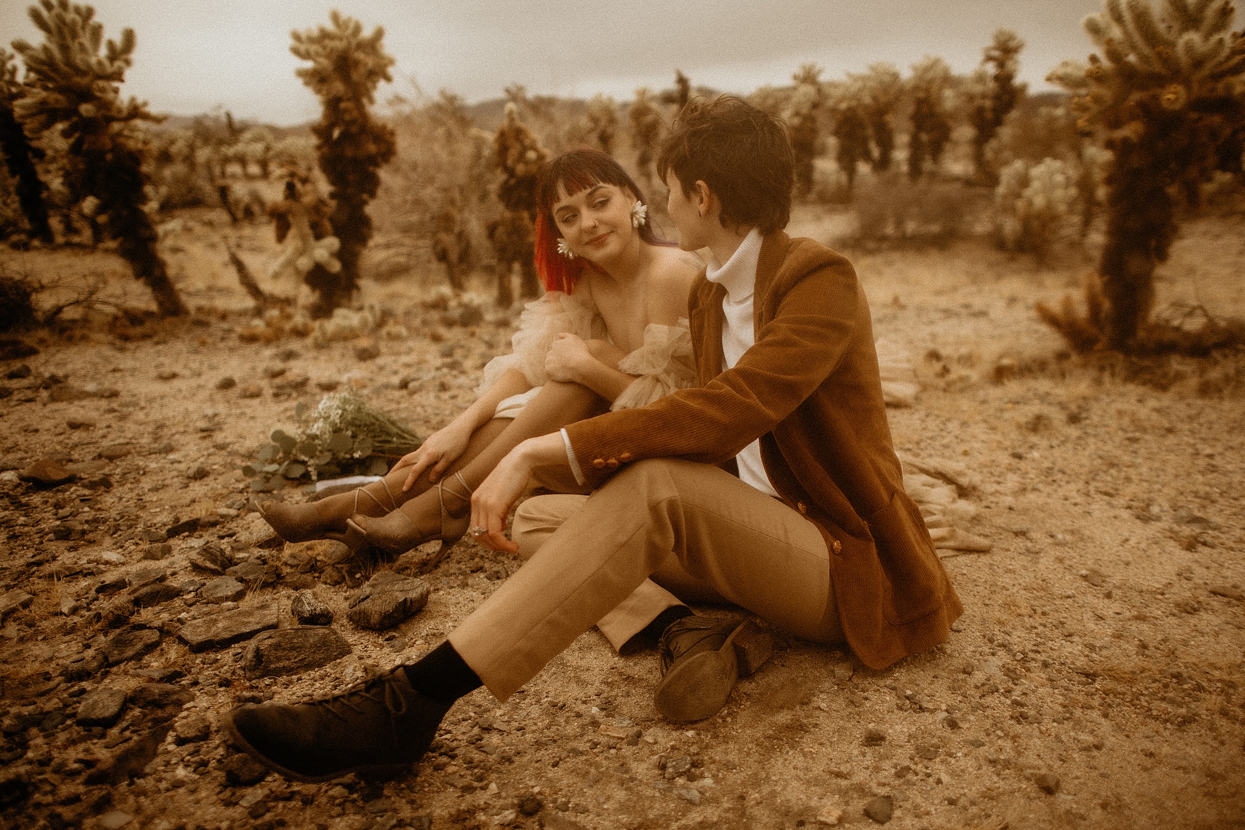couple sitting together desert landscape